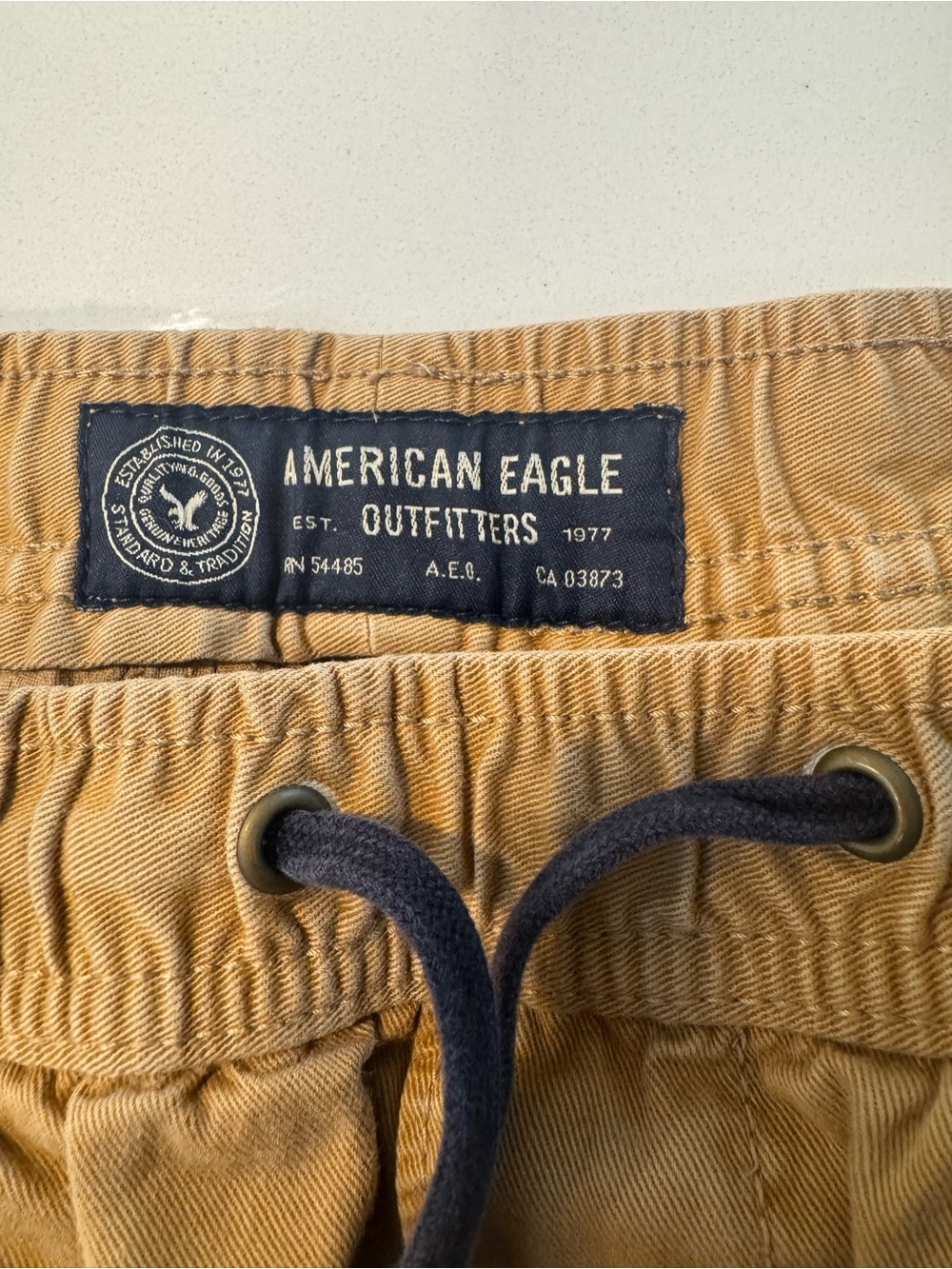 American Eagle Outfitters Tan Drawstring Pants with Navy Cord